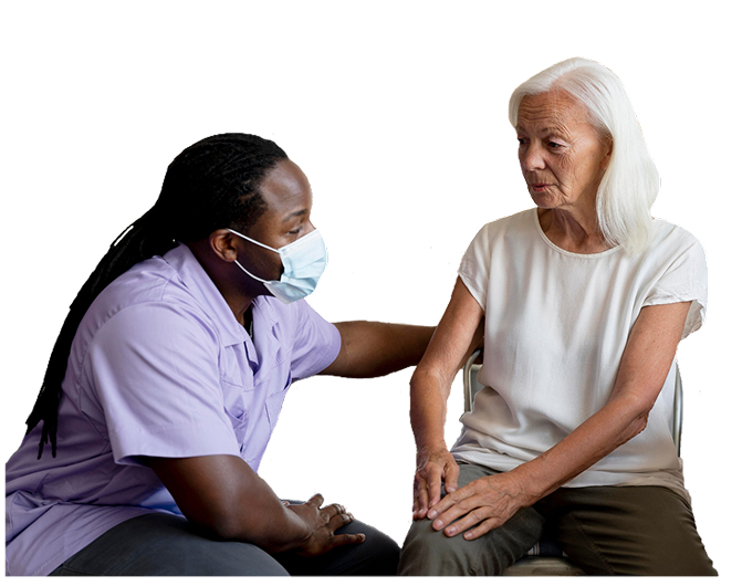 Caregiver speaking with an older adult